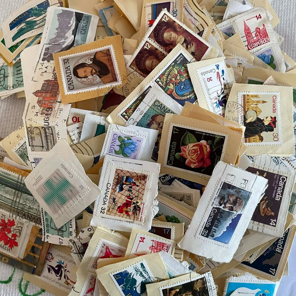 600+ MEGA LOT OF CANADIAN POSTAGE STAMPS ON PAPER, journaling, crafts, paper art